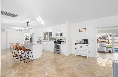 Fort Myers House | August Deal: Waterfront, Boat Dock, Hot Tub, Fishing & Pets Welcome