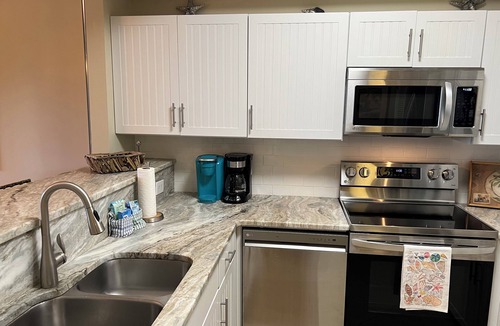 Four Mile Village Condo | AWESOME CONDO IN TOPS'L SUMMIT BETWEEN BEACH AND RACQUET CLUB - GREAT VIEWS!