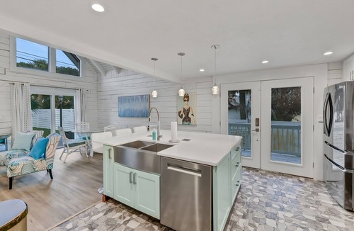 Daytona Beach House | Backyard paradise, huge pool, walk to beach