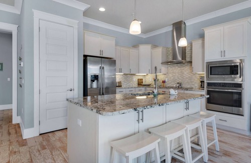 Navarre Beach House | “Bay Side Retreat” Luxury Home, Pool/Hot tub, Dog Friendly, Paddleboards