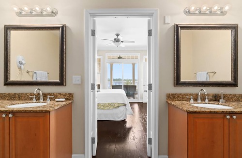 Upper Grand Lagoon Condo | Bayfront, 4th-floor condo with hot tub, pool & views of Nicklaus Golf Course