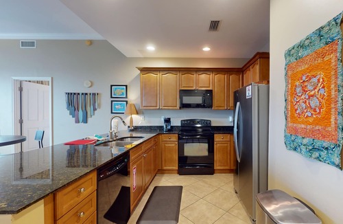 Upper Grand Lagoon Condo | Bayfront condo w/amazing views, shared hot tub & community pool