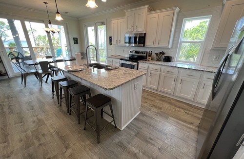 Cape San Blas House | Bayfront house with 500' dock, kayaks + big water views! October deals