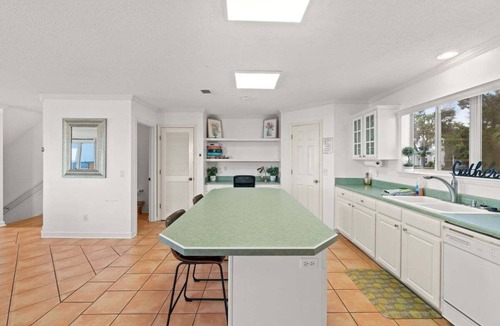 Panama City House | Bayfront townhome with private dock, fishing poles & 2 kayaks provided in Historic St. Andrew's!