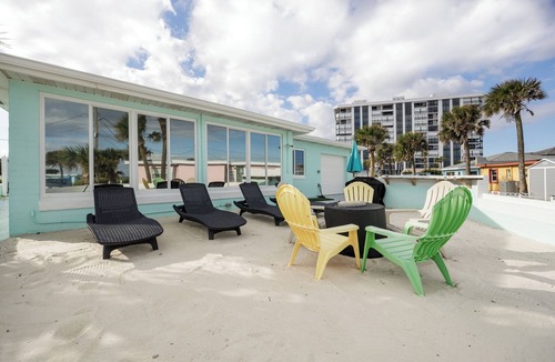 Sunny Shores House | Beach Family Retreat w/HOT TUB, Fire pit, Lots of games & only 100 Steps to Sand