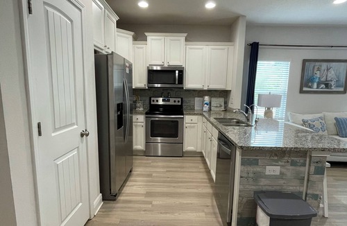 Thomas Drive House | Beach themed 3 bedroom 2 bath townhome with pool view