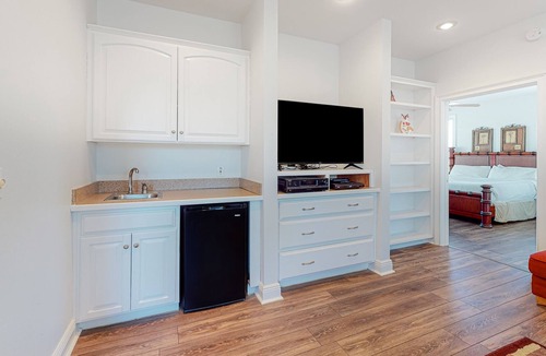 Treasure Beach Village House | Beach view dog-friendly home with a pool, tennis, fireplace, washer/dryer, grill