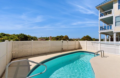 Plantation House | Beachfront home with a pool, game room, deck, grill, washer/dryer & central AC