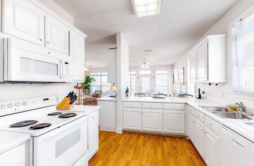 Audubon Place Condo | Beachy Duplex w/Full Kitchen, High-Speed WiFi, Central AC, and Washer/Dryer!