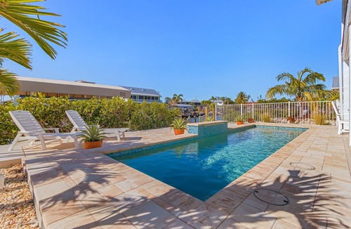 Pine Island Center House | Beautiful 3/3 Island Retreat with Heated Pool, Dock & Private Boat Ramp.