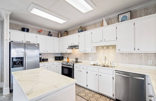 Silver Cay House | Beautiful bayfront home with views of the Dauphin Island Bridge