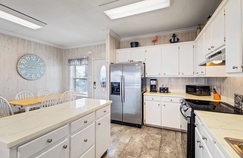 Silver Cay House | Beautiful bayfront home with views of the Dauphin Island Bridge
