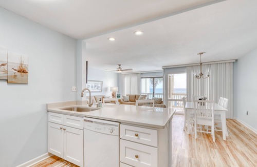 Fort Bay House | Beautiful beachfront condo with shared pool/hot tub and beach access