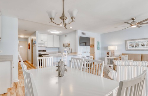 Fort Bay House | Beautiful beachfront condo with shared pool/hot tub and beach access