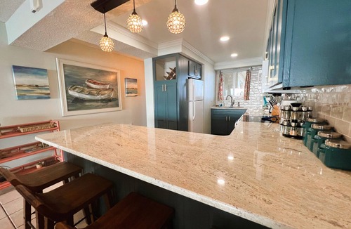 Biltmore Beach Condo | Beautiful Beach Front Condo with Pool and Hot Tub! Free Beach Chair Service!