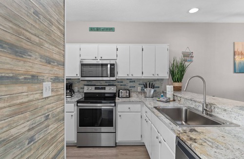 Miramar Beach House | Beautiful Beach House with Pool Access Central Location 5 minute walk to Beach!