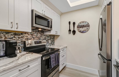 Bonita Bay Condo | Beautiful Bonita Bay Condo! Beach Shuttle, Pool, Kayaks, Tennis & Over $100 of Free Daily Activities