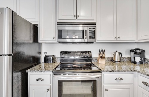 Gulf Place Condo | Beautiful condo with balcony view, community pools & hot tub