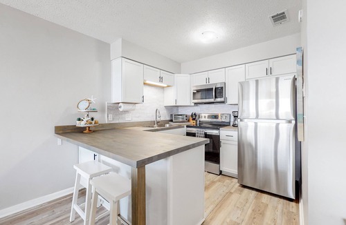 West Panama City Beach Condo | Beautiful ocean view condo with pool, private W/D, and easy beach access