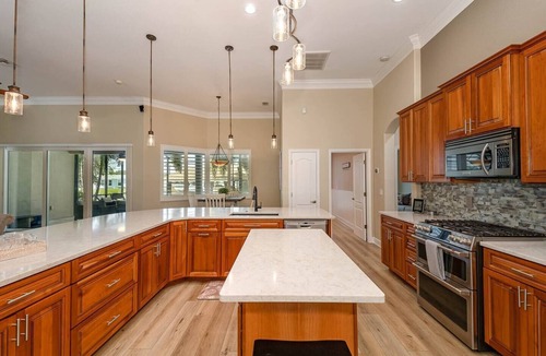 River Isles House | Beautiful waterfront 5 BR home with pool, kayaks