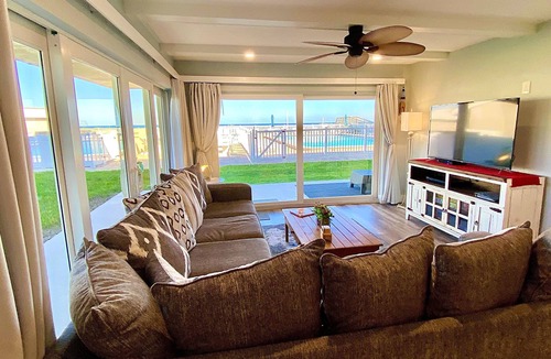 New Smyrna Beach Condo | Beautifully Updated Ground Floor Condo, Direct OCEAN Front on NO-DRIVE Beach!