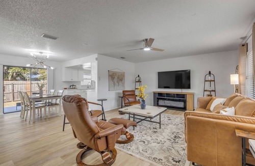 Edgewater House | Blue Door River House - Fenced Yard & Pet Friendly - Steps to the ICW
