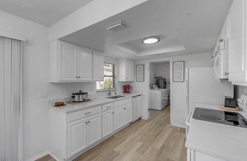Edgewater House | Blue Door River House - Fenced Yard & Pet Friendly - Steps to the ICW