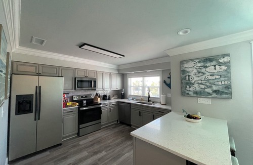 Holiday Isle House | Boaters paradise 4 bedroom 3 bath with 50' ft BOAT SLIP! Beach access