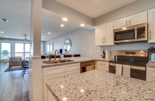 Sunnyside Condo | Brand New One Level direct beach front. No Crowds, Exceptional