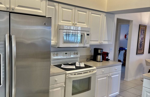 Central Naples House | Briarwood Vacation Home: Electric Heated Pool with Lake View - Naples, Fl