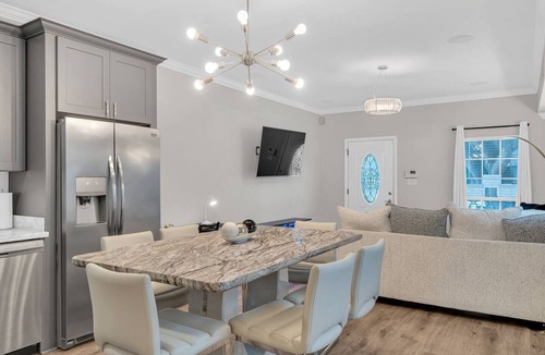 Tulane - Gravier Apartment | Bright 3BR Mid-City home with private patio & fenced yard. Steps to streetcar, near FQ & Superdome