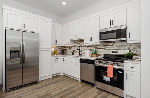 Commerce House | Bright and cozy new build - your retreat awaits.
