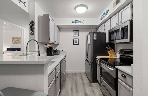 Indian Bayou Condo | Bright, coastal-chic 2BR/2BA retreat mins from the beach! Features a fully stocked kitchen, plush queen bed, cozy second bedroom, and 2 full baths. Enjoy access to the community pool and fitness center. Near Destin Harbor, shopping, and dining!