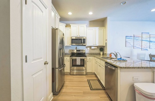 Upper Grand Lagoon House | Bright & Modern Beach Getaway-Pool+Prime Location