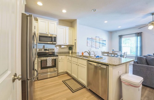 Upper Grand Lagoon House | Bright & Modern Beach Getaway-Pool+Prime Location