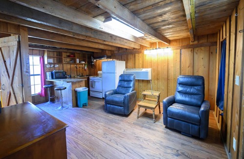 Lake Village Cabin | Cabin with sleeping loft in peaceful pecan orchard on Lake Chicot