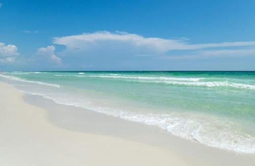 Panama City Beach House | Calypso 3 New Relax Unwind Luxury PCB next to Pier Park 3 Bed 2 Bath Pool Hot Tub Tikki bar