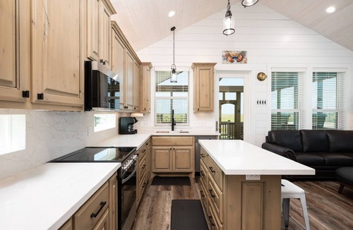 Port Bolivar House | Canal front cutie with Boat lift, RV Hook-Up, Bay access, and Ocean view!