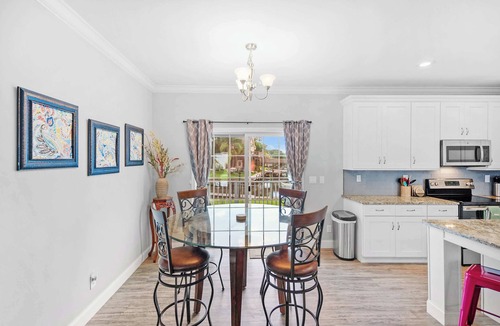 Butler Beach House | Canal Home, Dock, BBQ, Walk to Beach, Fishing