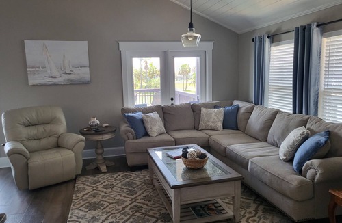 Jamaica Beach House | Canal home - Hot tub, Fish light, Kayaks, Paddle board & close to the Beach