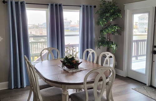 Jamaica Beach House | Canal home - Hot tub, Fish light, Kayaks, Paddle board & close to the Beach