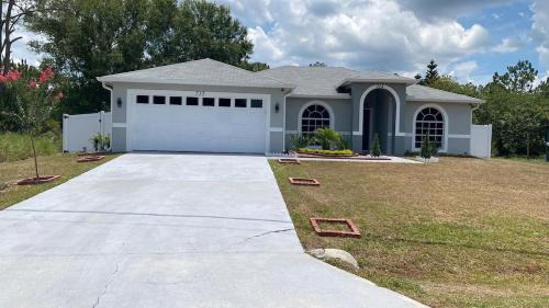 Poinciana House | Caracara