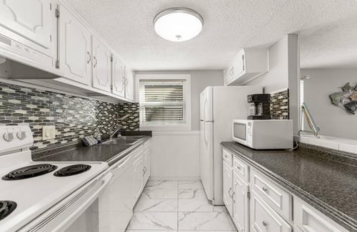 West Panama City Beach Condo | Carport Parking and Ground Floor Entry, Family Friendly!