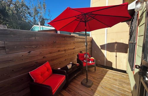 Tulane - Gravier Condo | Charming 1-bedroom duplex within steps from Canal Streetcar in New Orleans