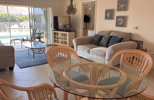 Pelican Condo | Charming 2-bedroom condo with WiFi, in Cape Coral with pool, spa, & water view.