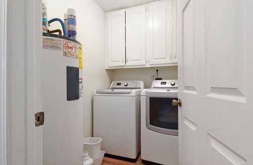 Thomas Drive House | Charming 3-bedroom Riverfront house with WiFi, AC in Panama City Beach FL