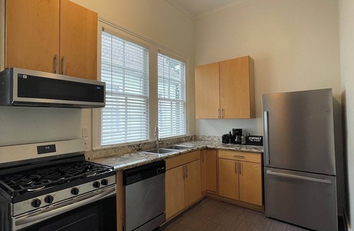 Touro Condo | Charming 3-bedroom condo 700 ft from St. Charles Streetcar in Uptown New Orleans