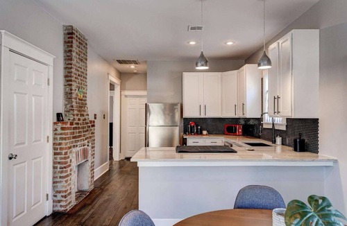 West Riverside House | Charming 3BR Uptown home with fenced yard. Walk to Magazine St, near streetcar & FQ.