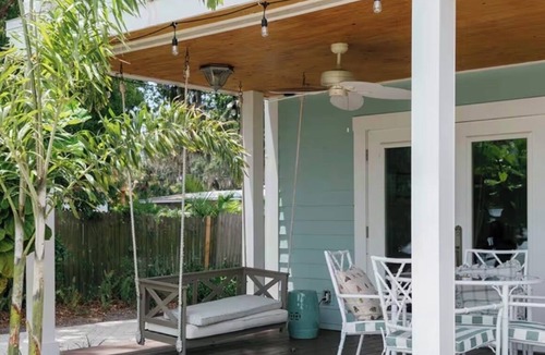 Palmetto House | Charming historic Little Blue House with a water view.
