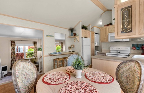 Upper Grand Lagoon Cottage | Charming pet-friendly cottage in a gated resort with amenities on the east end of Panama City Beach!